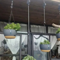 Crochet mural ajustable pour plantes